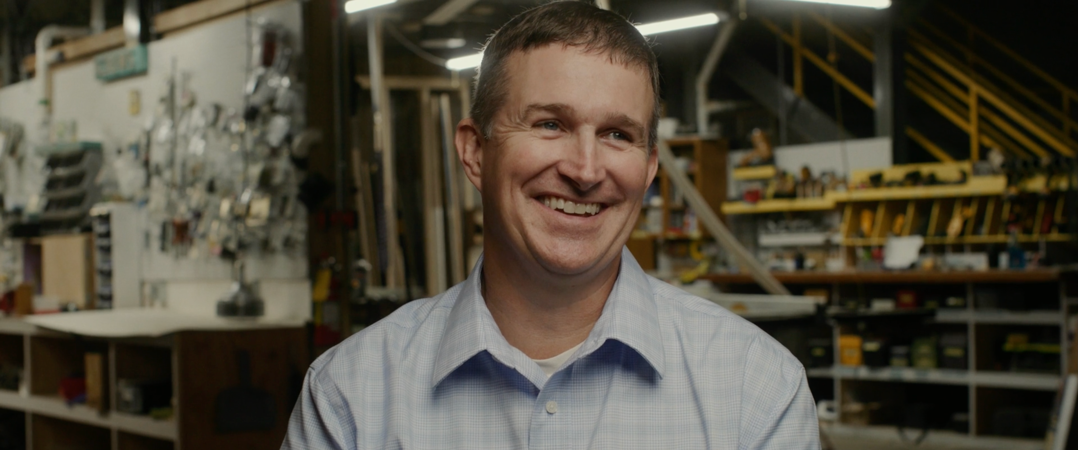 smiling man in workshop
