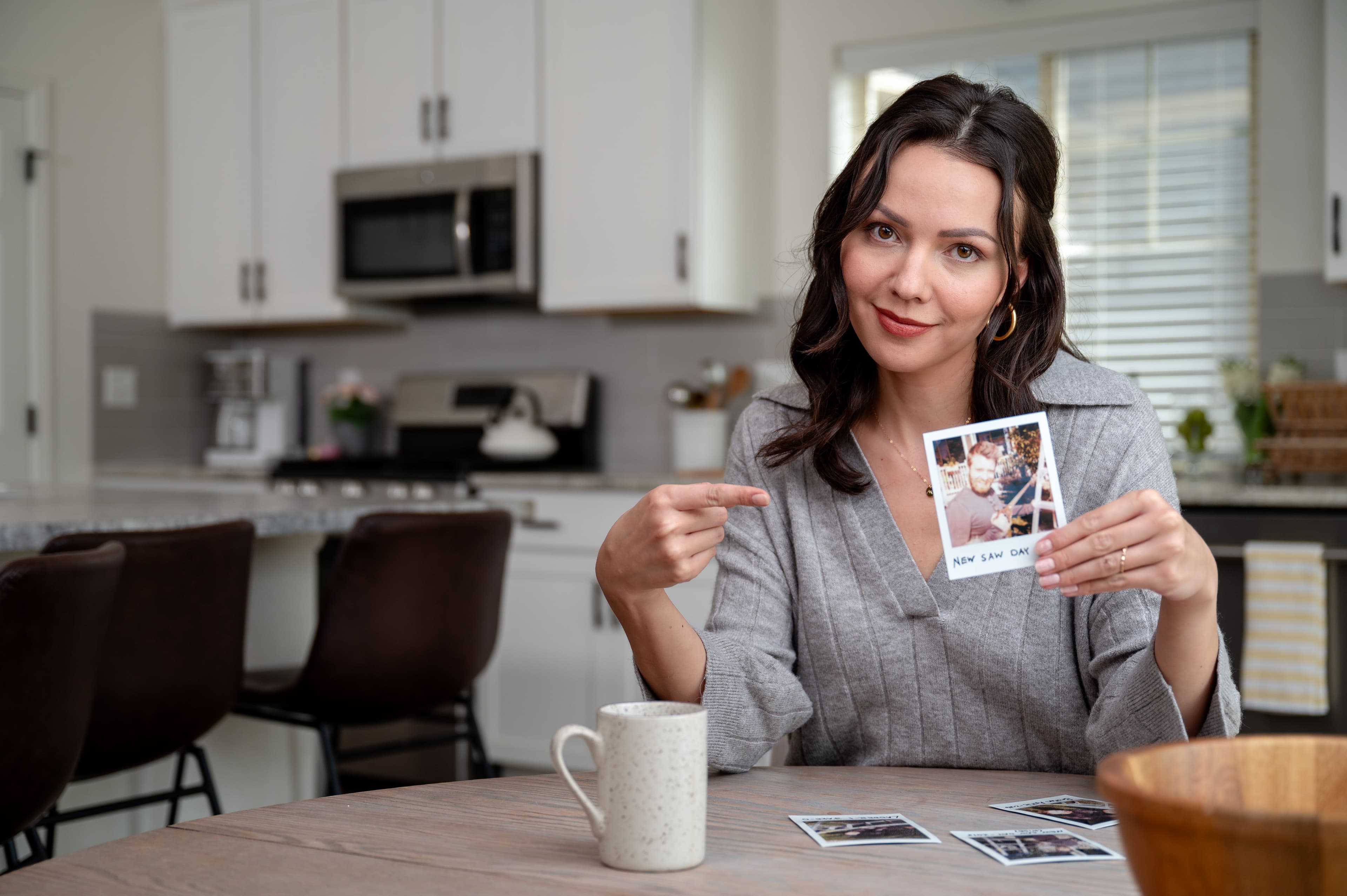 woman with polaroid photo