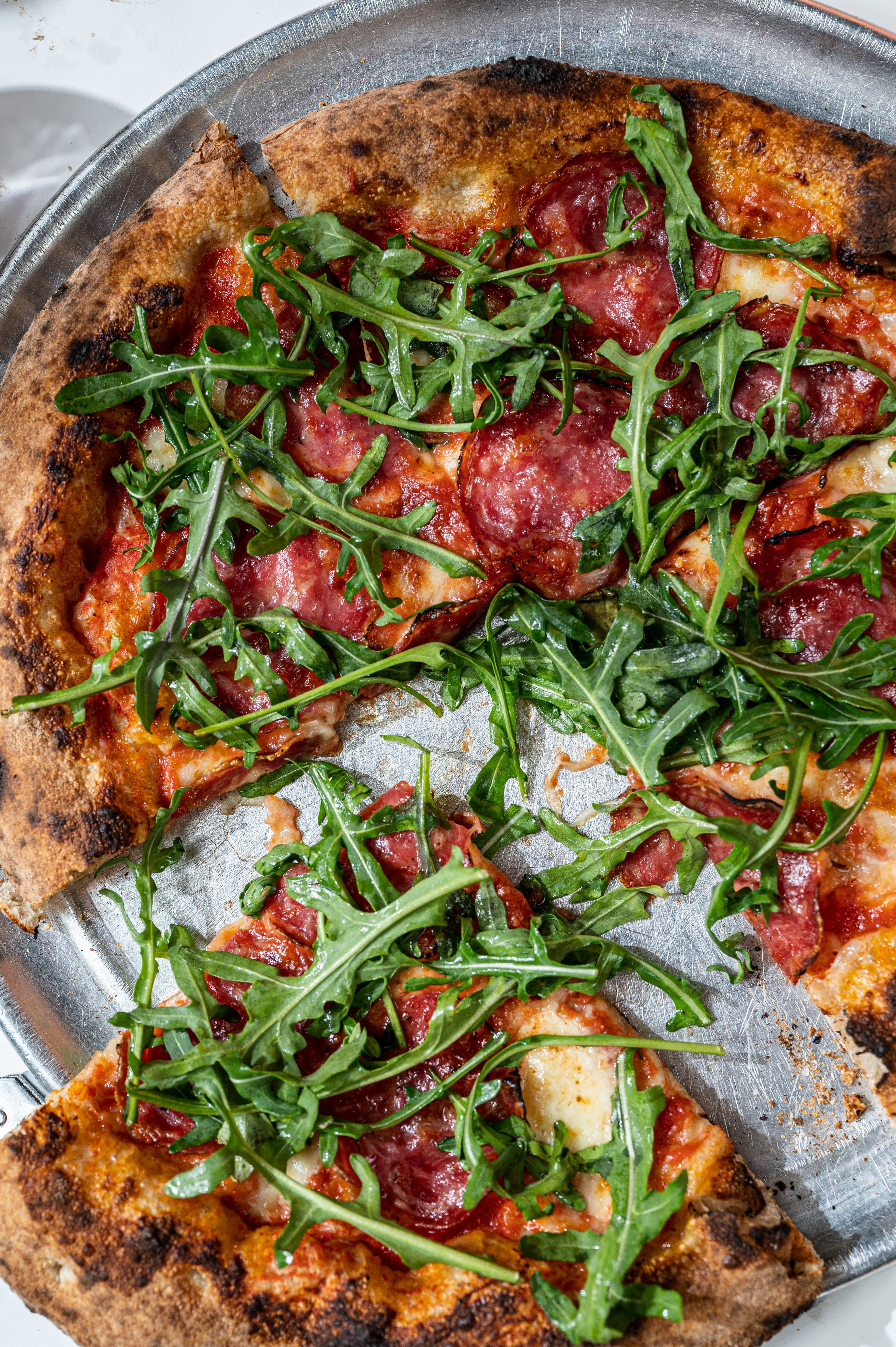 Pizzeria Luca pepperoni pizza with arugula