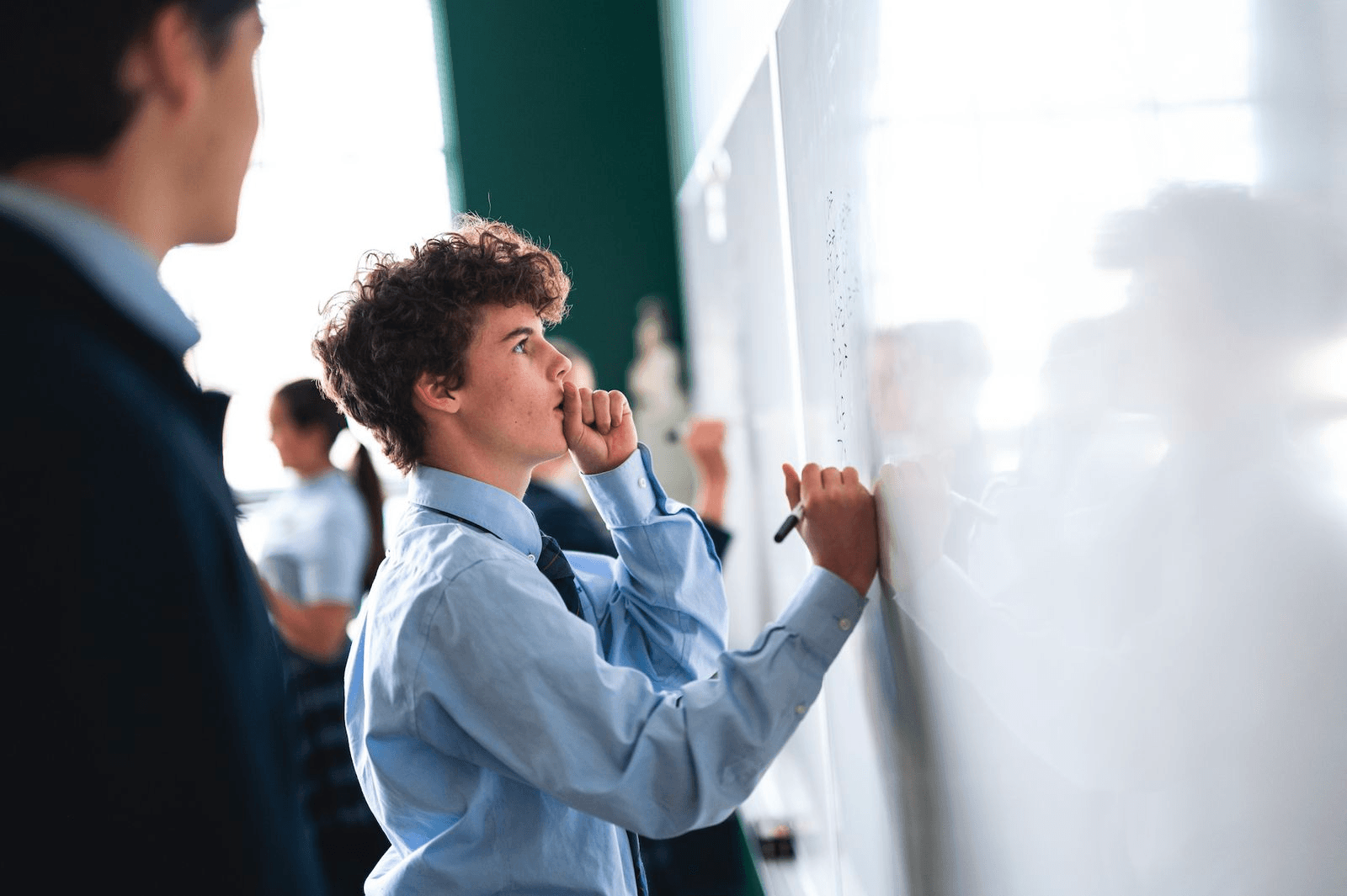 students at whiteboard