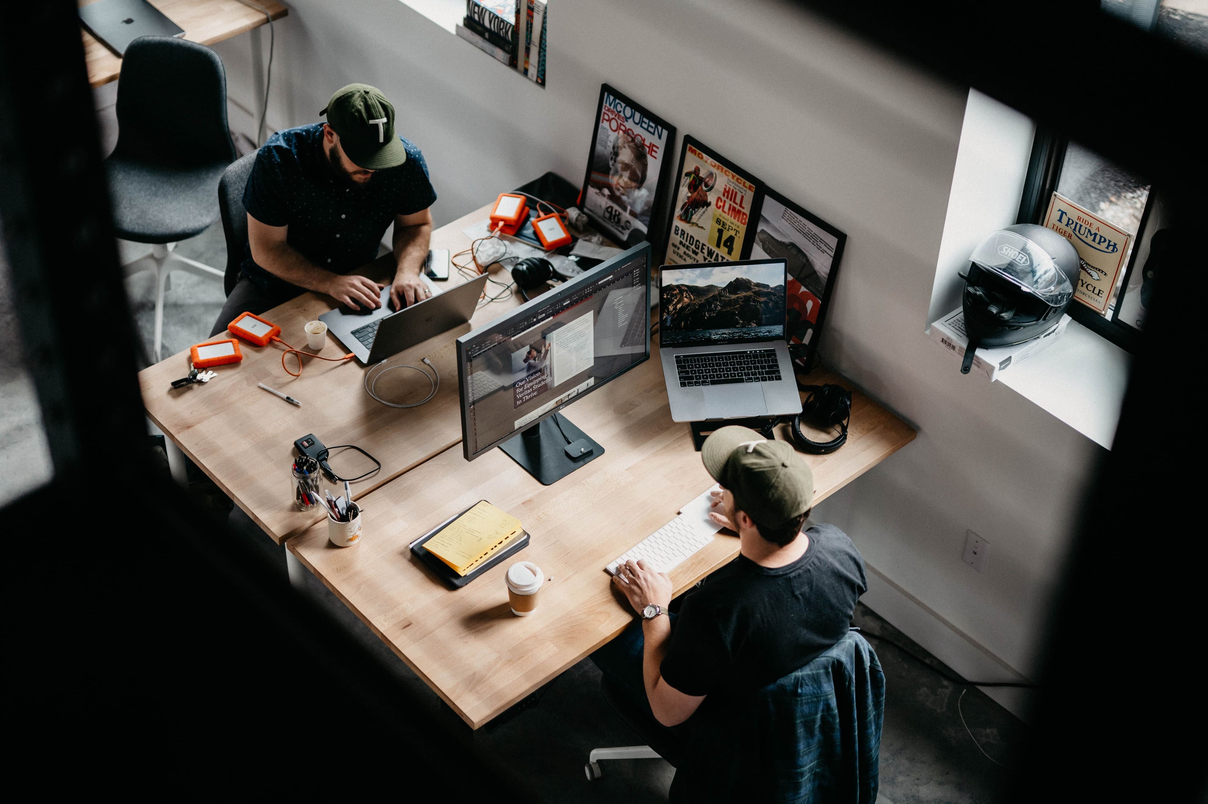 Men working at desks