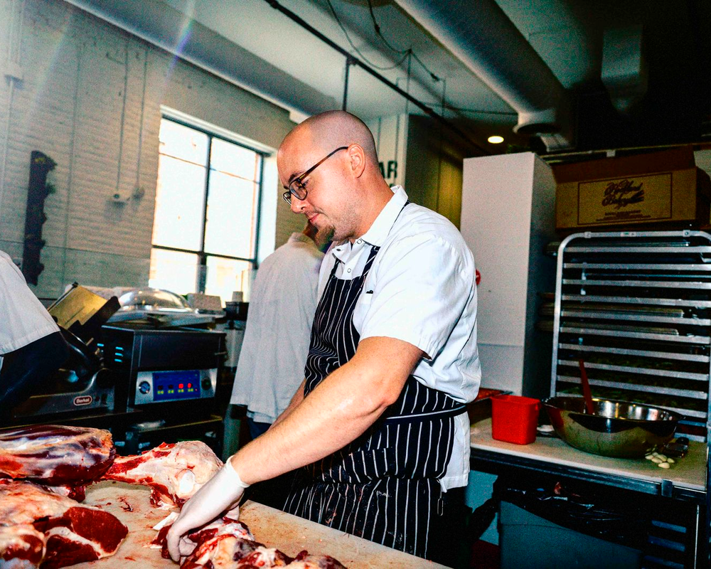 butcher prepping meat at Cabalar Meat Co.